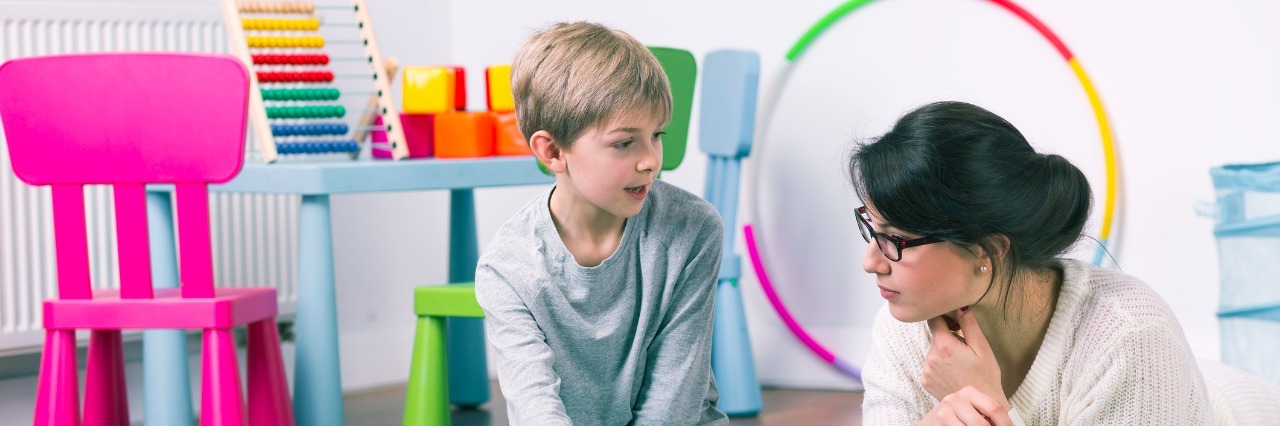 Advice for Families With New Apraxia Diagnosis Private teacher and small boy learning by play at home