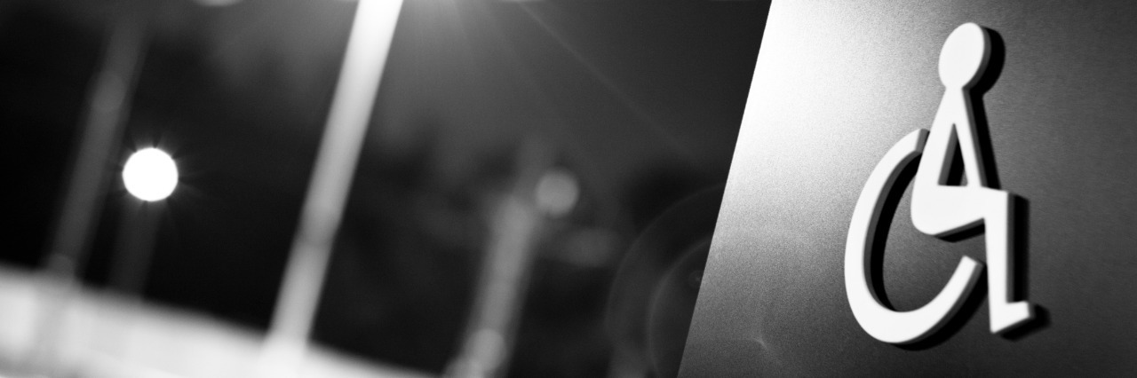 What It's Like to Have a Chronic Disease and Disability Disabled sign, wheelchair, traffic lights, black and white