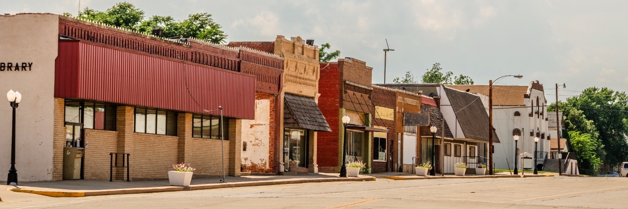 Downtown in a small town in Oklahoma with buildings of various ages and architectural styles.