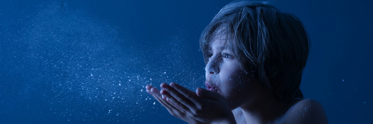 Lessons From 9 Years Parenting a Child With 22q11.2 Deletion Child with fairy dust.