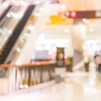 Blurry image of escalator and shopping mall