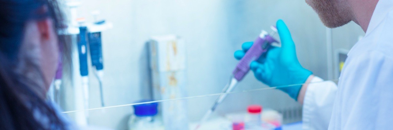 Having a Mental Illness in a Scientific Field two science students working in a lab