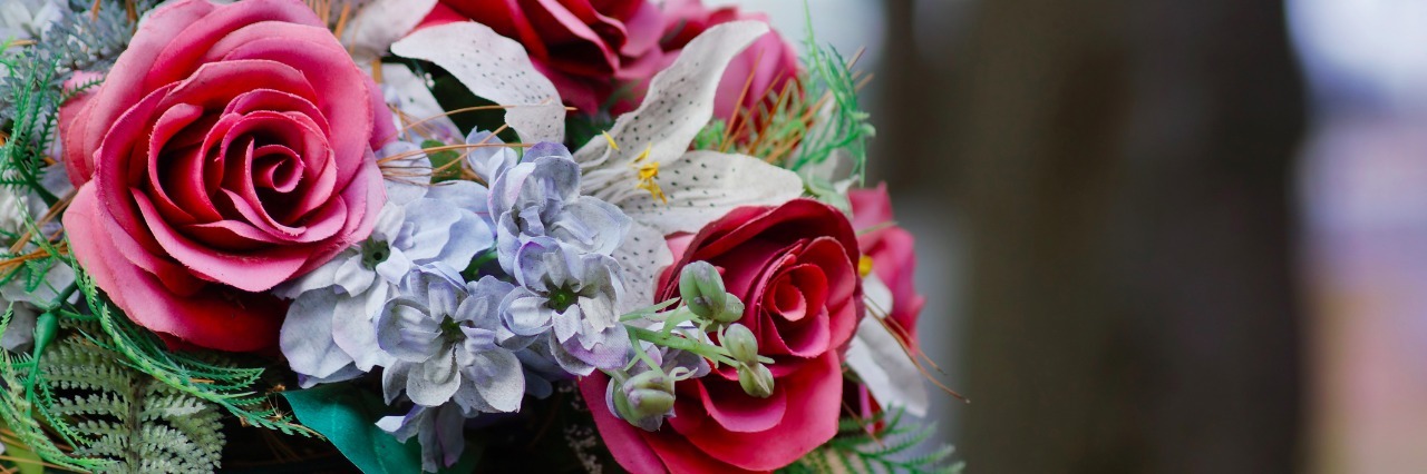 bouquet of flowers on a gravestone