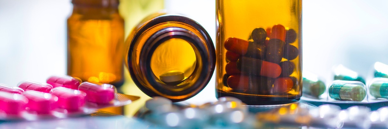 How I Developed Tardive Dyskinesia After Taking Psych Meds medication bottles and pills