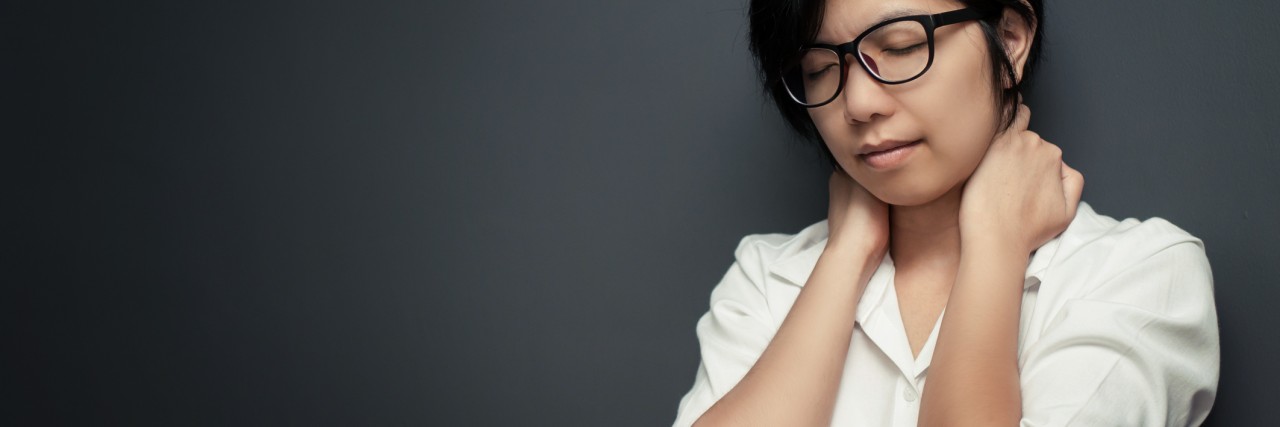 How to Deal With Intrusive Thoughts young woman who looks like she's distressed