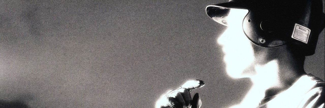 How Migraines Feel Like Playing a Game Side profile of a baseball player