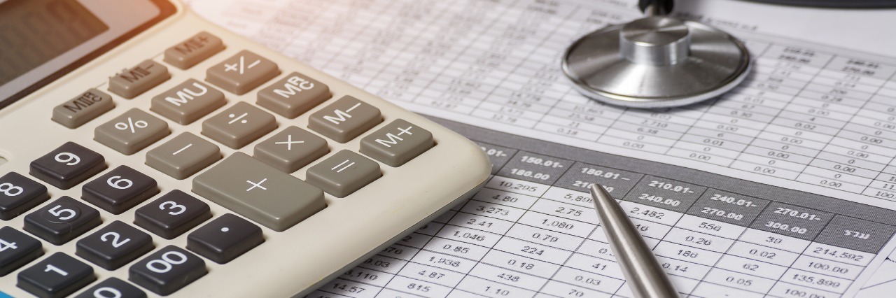 Letter of Apology to Insurance Company Health insurance form with stethoscope and calculator