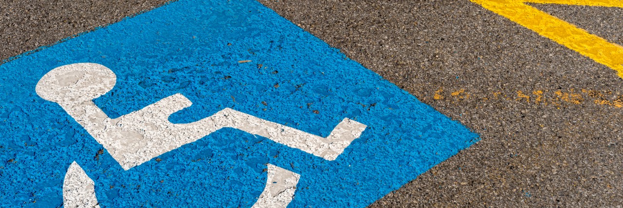 Getting a Permanent Disability Parking Placard for My Daughter Disability parking space.