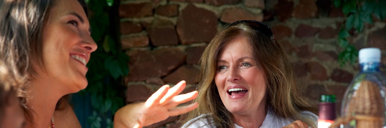 Why You Shouldn't Use Mental Disorders as Adjectives woman and daughter eating lunch outdoors