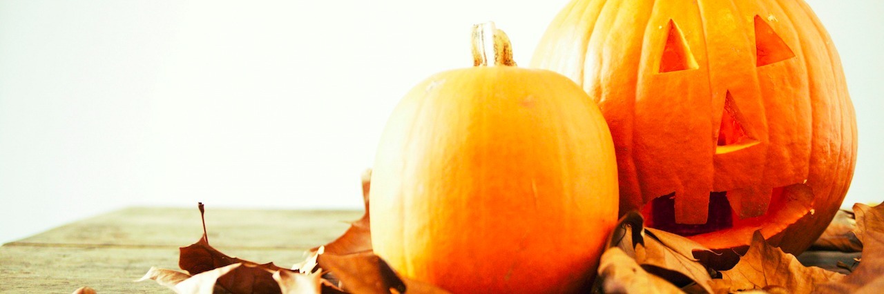 How PTSD Affects Halloween pumpkins and crushed leaves on the table