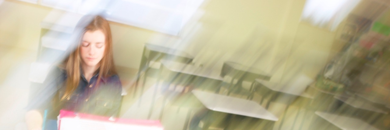 Ways to Help Students With Mental Illnesses Lonely teenage girl in classroom