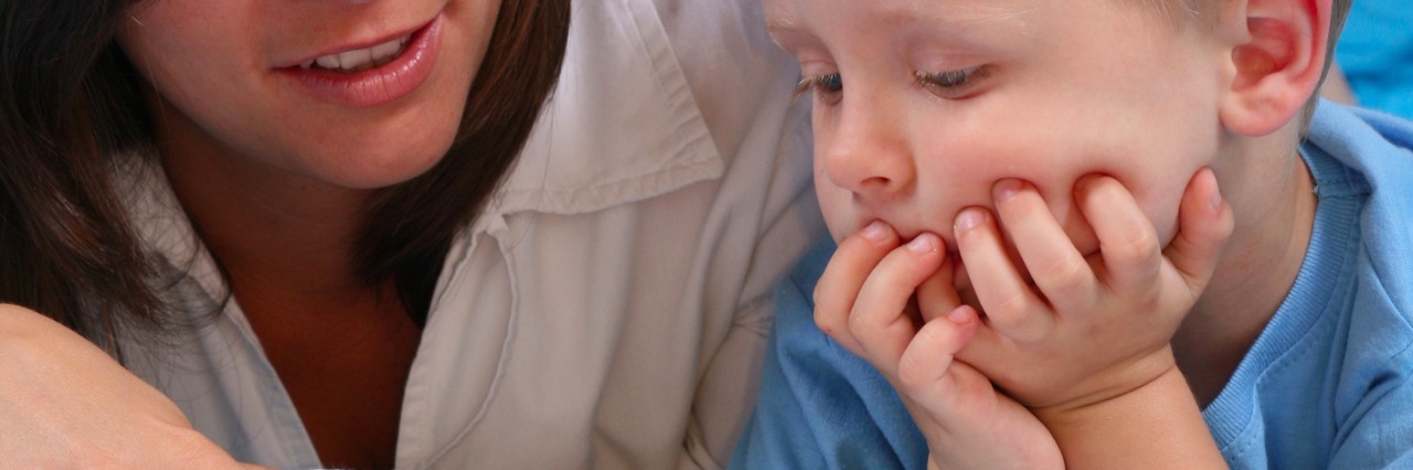 Autism: Tips for Parents Whose Child Is Having Difficulty Sleeping Mom reading son bedtime story