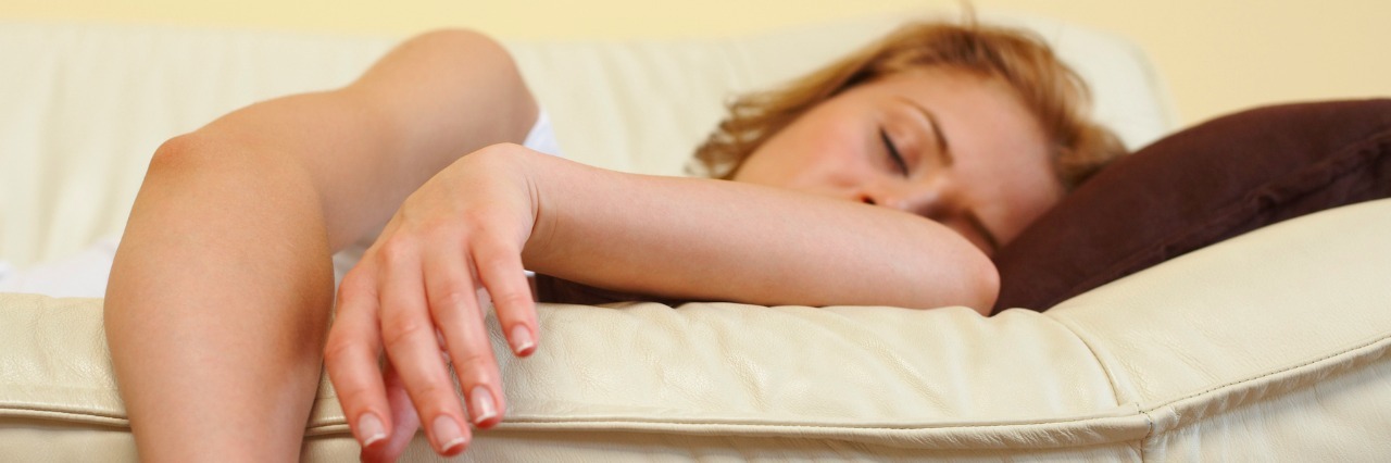 Explaining My Exhaustion to People Who Don't Understand Woman sleeping on sofa