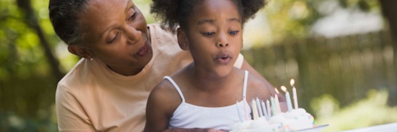 Cancer: Why Just Being There for People Matters Grandmother and granddaughter with birthday cake