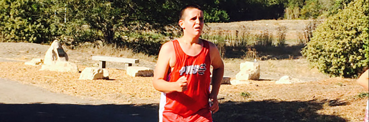 Cross-Country Running as a Childhood Cancer Survivor With Disabilities Dylan running.