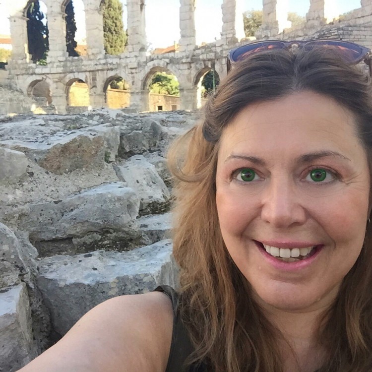 woman at amphitheater in pula, croatia