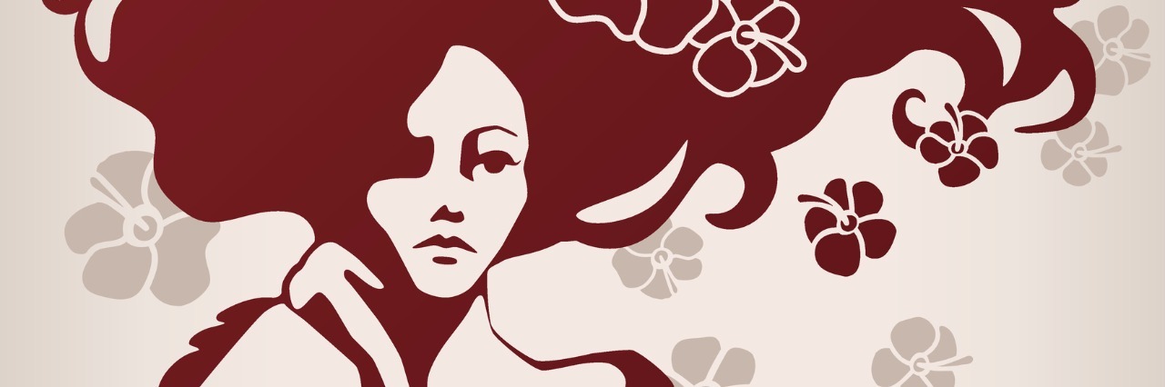 Lesson Learned From Having Chronic Pain woman with waving hair with chin on hand and holding a feather