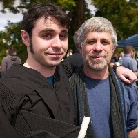 Father and son at son's graduation