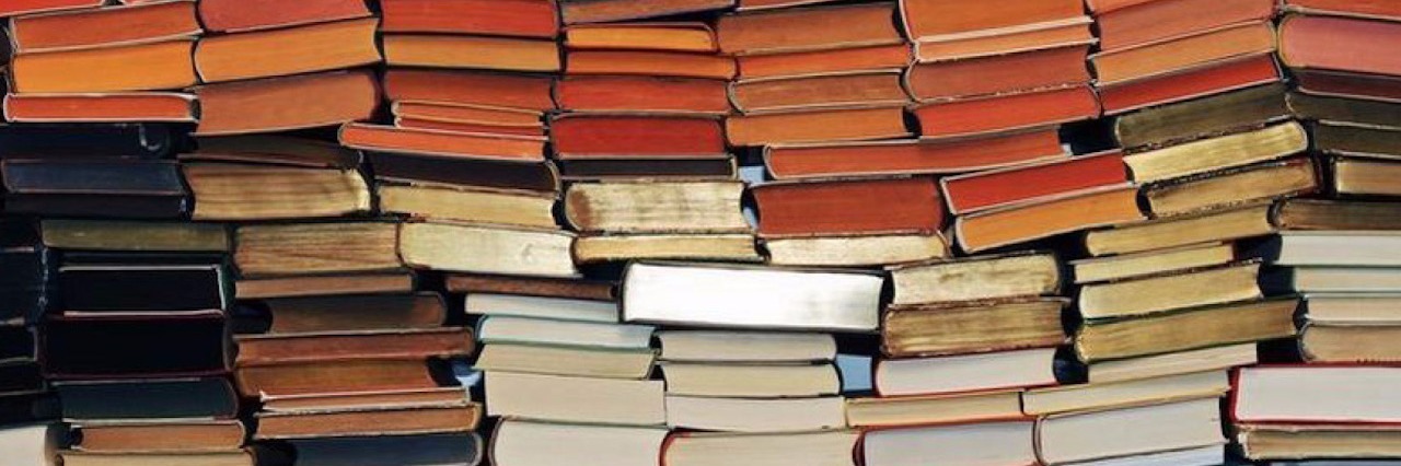 Dealing With Fear and Anxiety as a College Student With Lupus colorful stacks of books