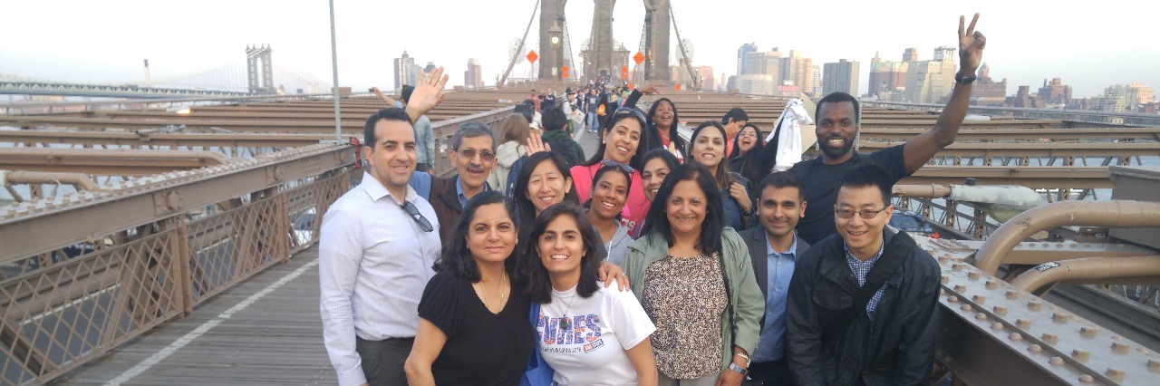 How to Deal With Election Anxiety With Crohn's Disease and Ostomy group of people standing on a bridge