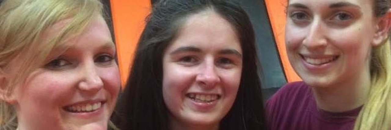 Scimitar Syndrome: Thankful to My Rare Congenital Heart Defect three friends in matching maroon shirts smiling backstage during a film shoot