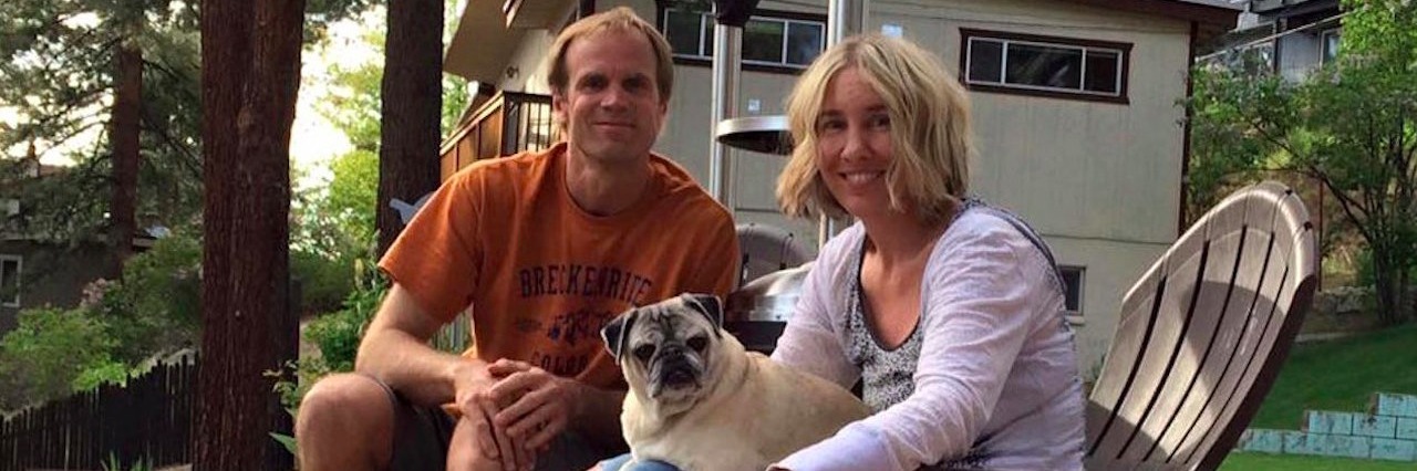 Migraine Associated Vertigo: Why We Stopped Going to Concerts man and woman sitting outside on a patio with their pug