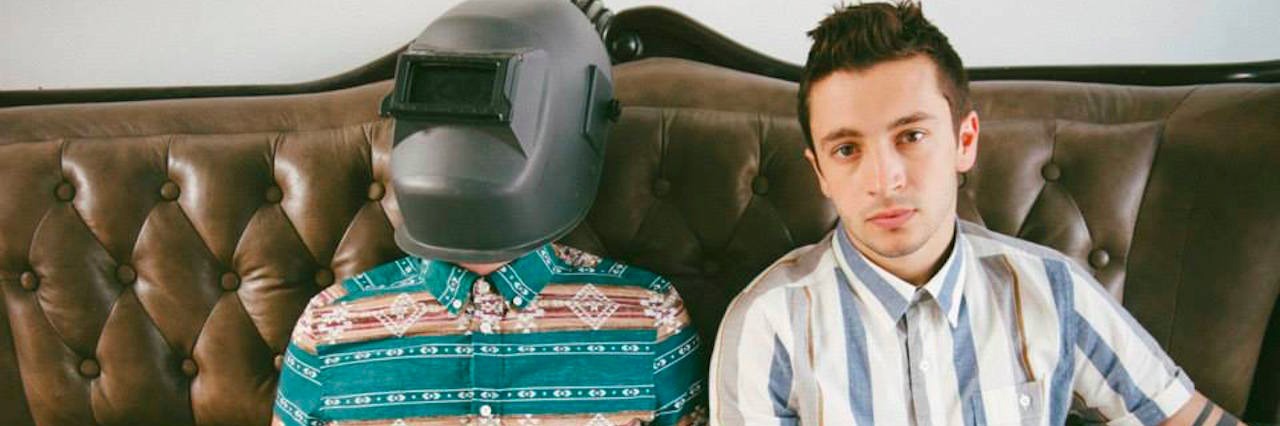 How Twenty One Pilots Helped Me Through Depression the two members of Twenty one pilots sitting on a couch