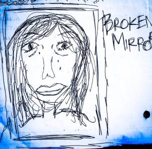 a self-portrait of the author with the words: Broken Mirror