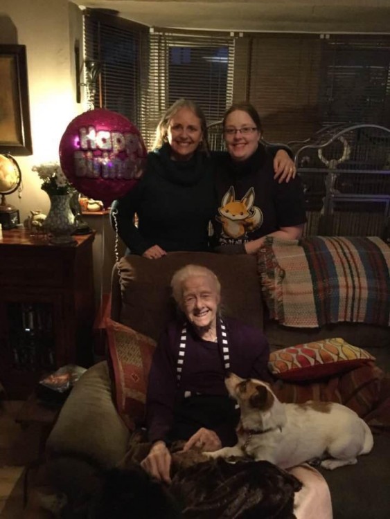 grandmother, mom and daughter by couch at party