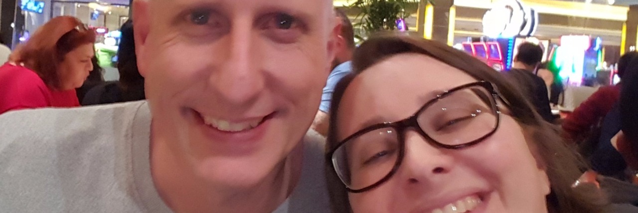 Importance of a Trusted Person Supporting You Through Illness author and her husband smiling