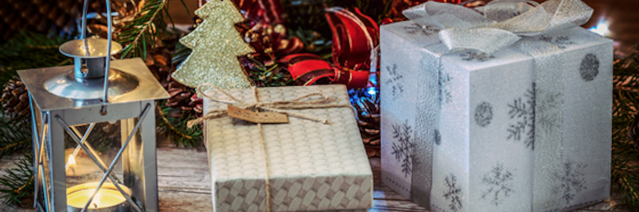 Tips for Making Holidays More Enjoyable With Chronic Illness wrapped presents under a christmas tree