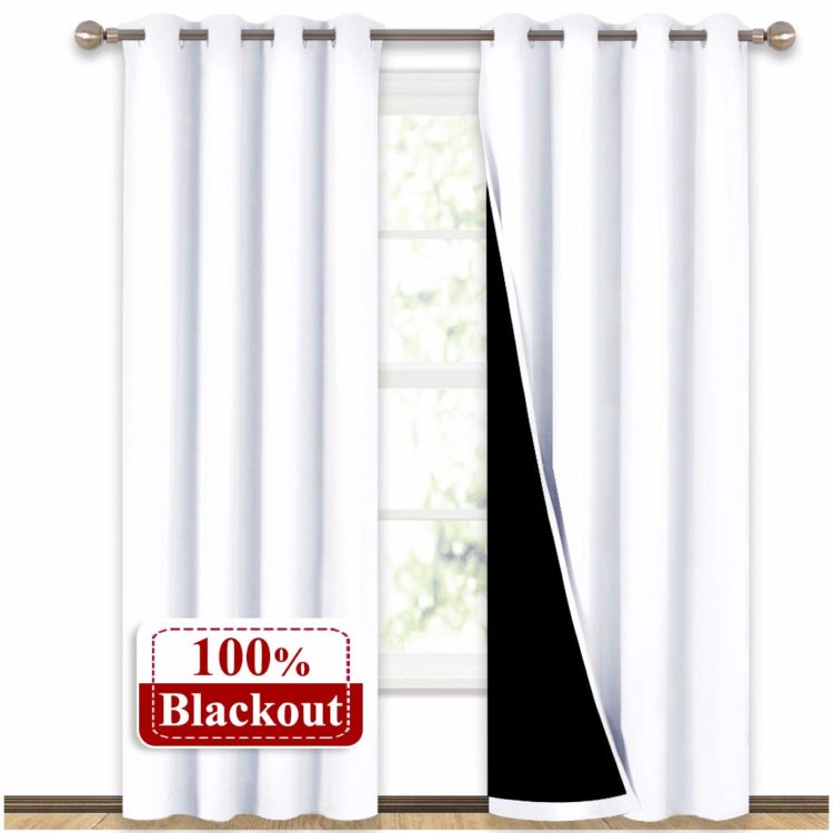 white blackout curtains hung up