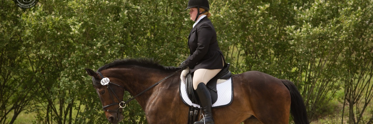 Understanding Limitations as an Equestrian With Ehlers-Danlos Syndrome author riding on her horse