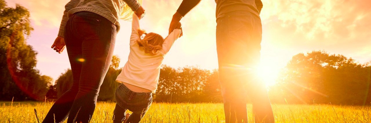 Social Media Made Our Family’s Rare Disease Journey Less Isolating parents hold baby's hands