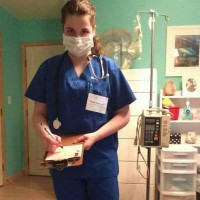 physician’s assistant wearing scrubs