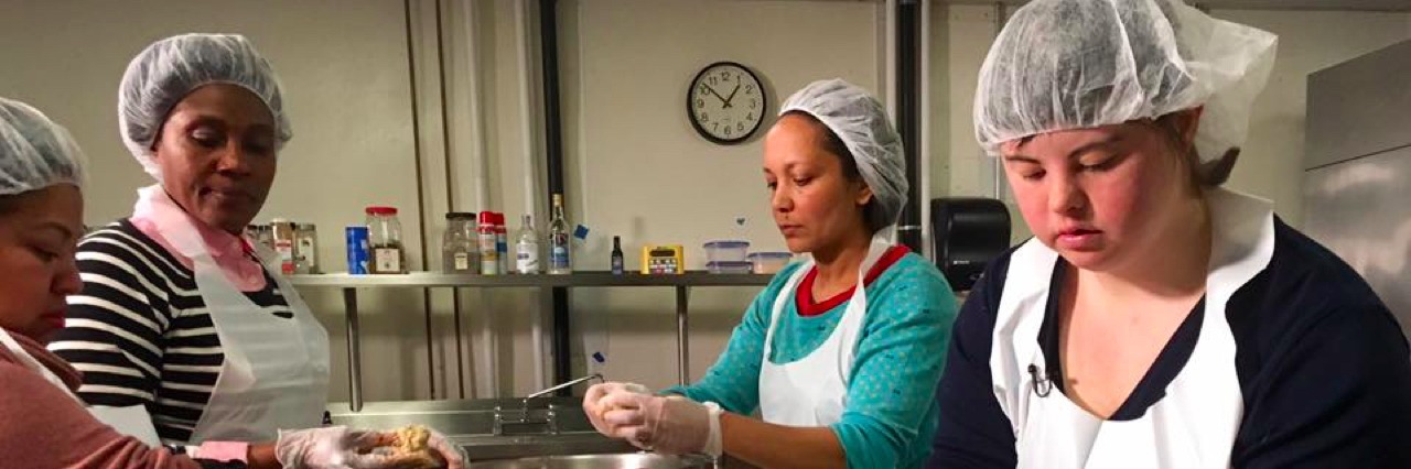 Collette Divitto, Woman With Down Syndrome, Starts Cookie Business Woman baking in a professional kitchen