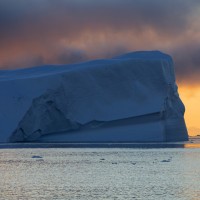 Ship close to an iceberg.