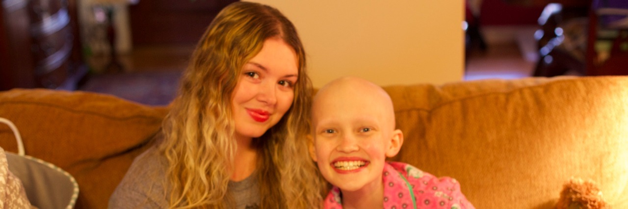 young woman and childhood cancer patient