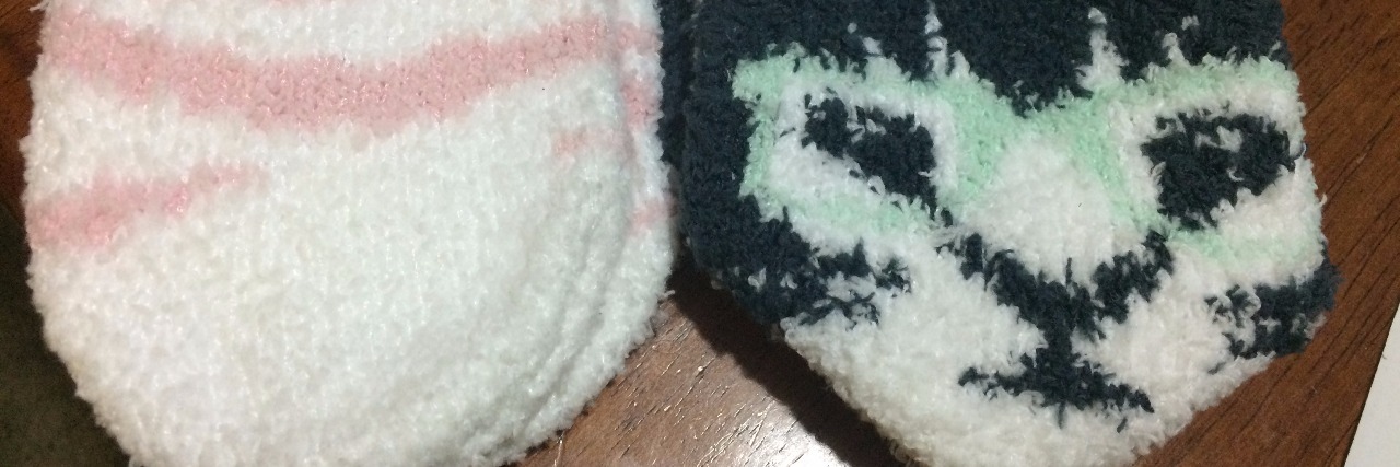 Complex Regional Pain Syndrome: Personalizing Crutches and Socks fuzzy socks with pink zebra stripes and cats