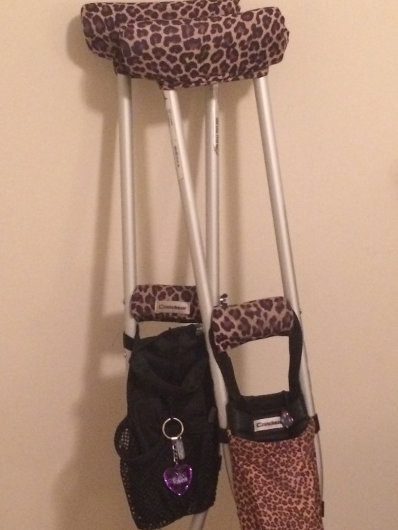 crutches decorated with leopard print fabric