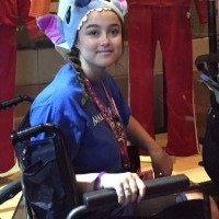 girl sitting in wheelchair