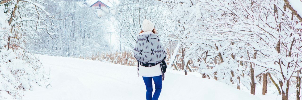 New Year’s Resolutions as a Person With an Invisible Illness woman walking on winter day