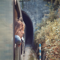 Depressed young woman in the train