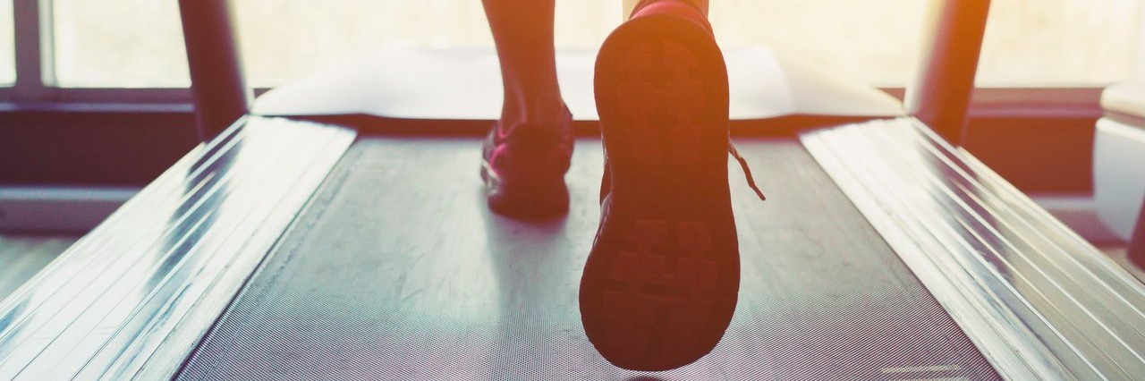 Woman With Lupus Feels Powerful at the Gym woman running on a treadmill