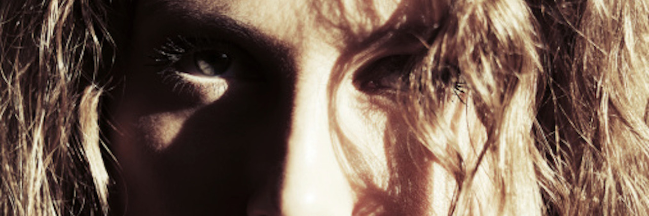 Letter to Someone With Hidden Anxiety Sad beautiful woman with long curly hairs