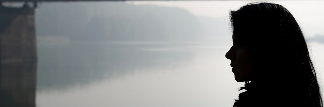 My Organ Transplant Doesn’t Make Me Different woman looking at a bridge