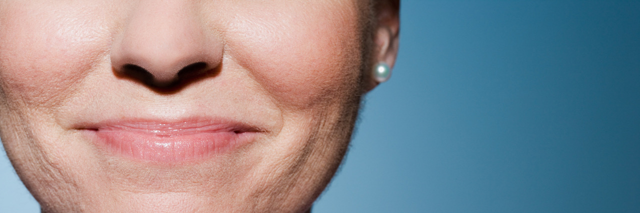 When You Hide Anxiety and Depression Behind a Fake Smile Woman smiling