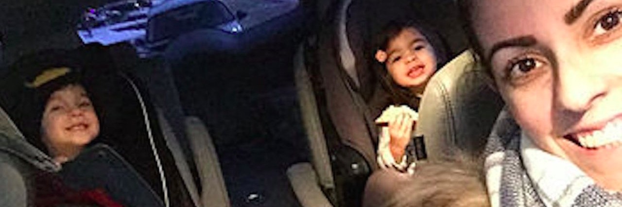 I’m a Mom and Have Crohn’s Disease mother in a car with her two children