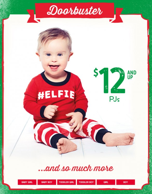 Photo of Asher Nash wearing a sweater that says #Elfie