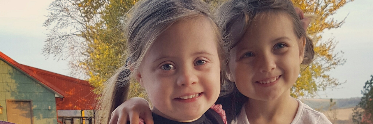 Sharing Our Daughter's Down Syndrome Diagnosis With Her Siblings Becky's daughters.